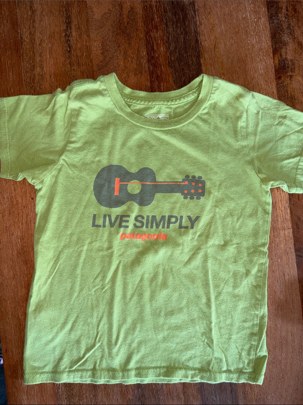 Patagonia- Green Kids Tee with Guitar "Live Simply"